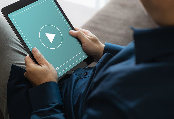 Man watches video on tablet