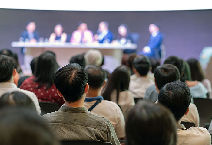 Conference from a seat in the audience