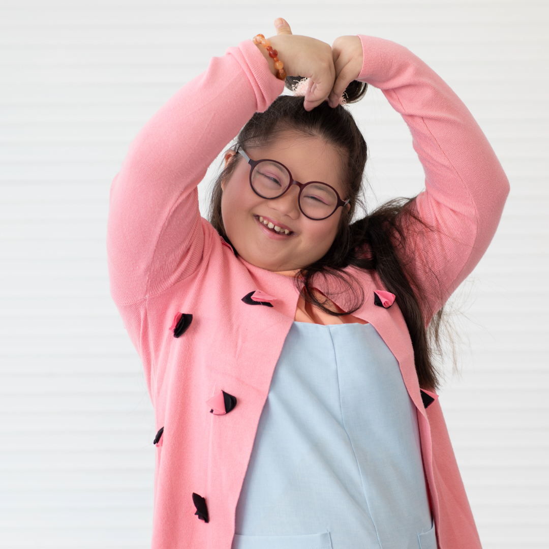 image special needs girl asian pink sweater