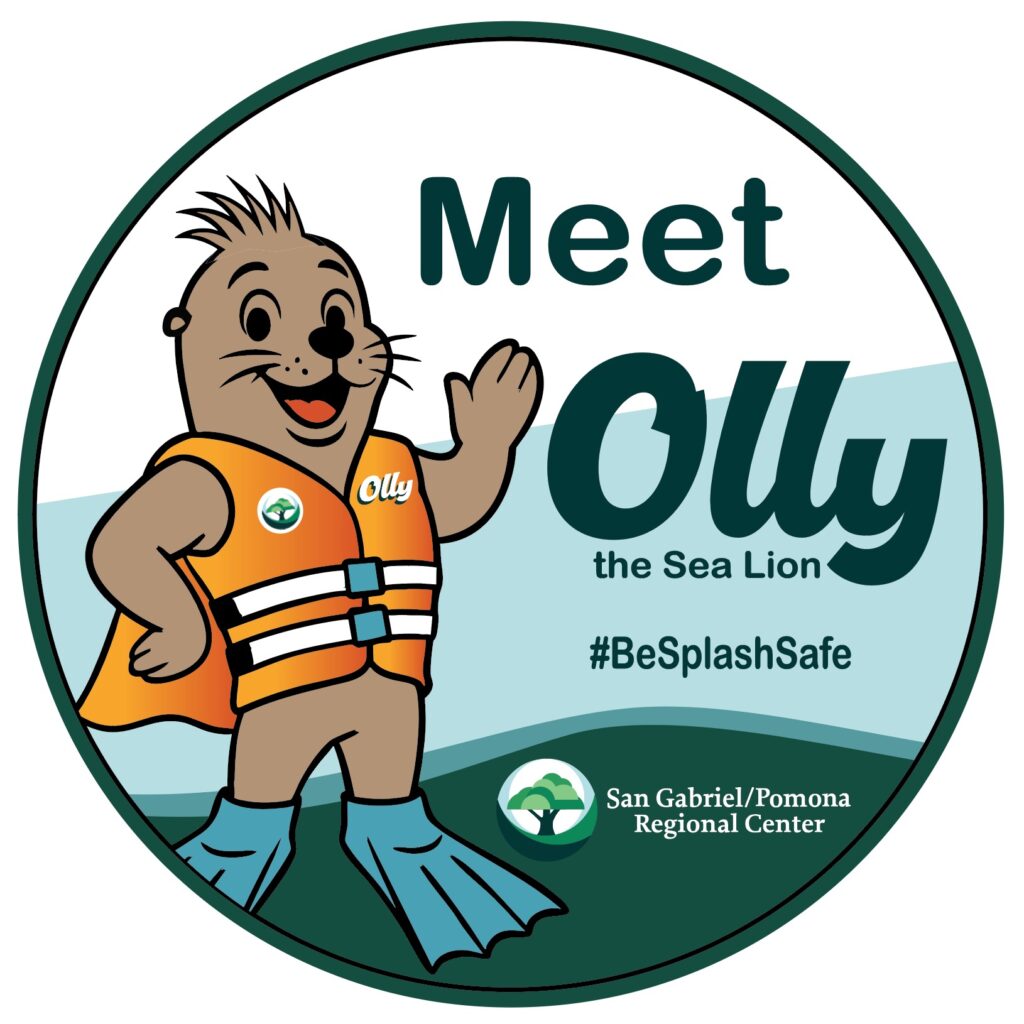 Cartoon sea lion named Olly wearing an orange life vest and flippers, waving. Text: "Meet Olly the Sea Lion #BeSplashSafe San Gabriel/Pomona Regional Center.